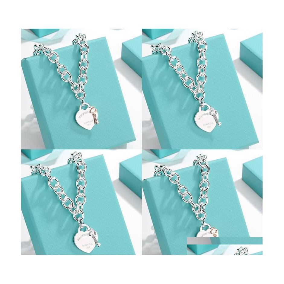 

Pendant Necklaces Pendant Necklaces Sweater Chain Design Brand Key Heart Necklace Gold Sier For Women Jewelry Gift Drop Delivery 202 Dh6Rk