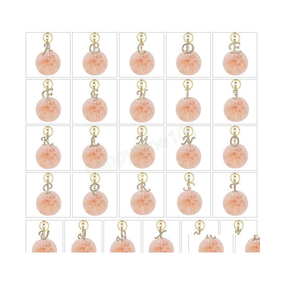 

Key Rings Fluffy Pink Pompom Faux Rabbit Fur Ball Keychain Crystal Golden Letters Key Rings Trendy Jewelry Bag Accessories Gift Drop Dhscw