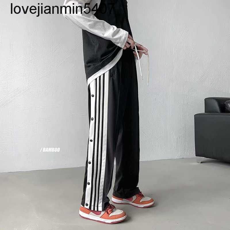 

Fashionable Men' Jeans Factory Wholesale and Retail New Fashion Side Button Sports Pants Ad Three Bar Breasted Loose Casual Gaojiechao Brand Fog Same, Black