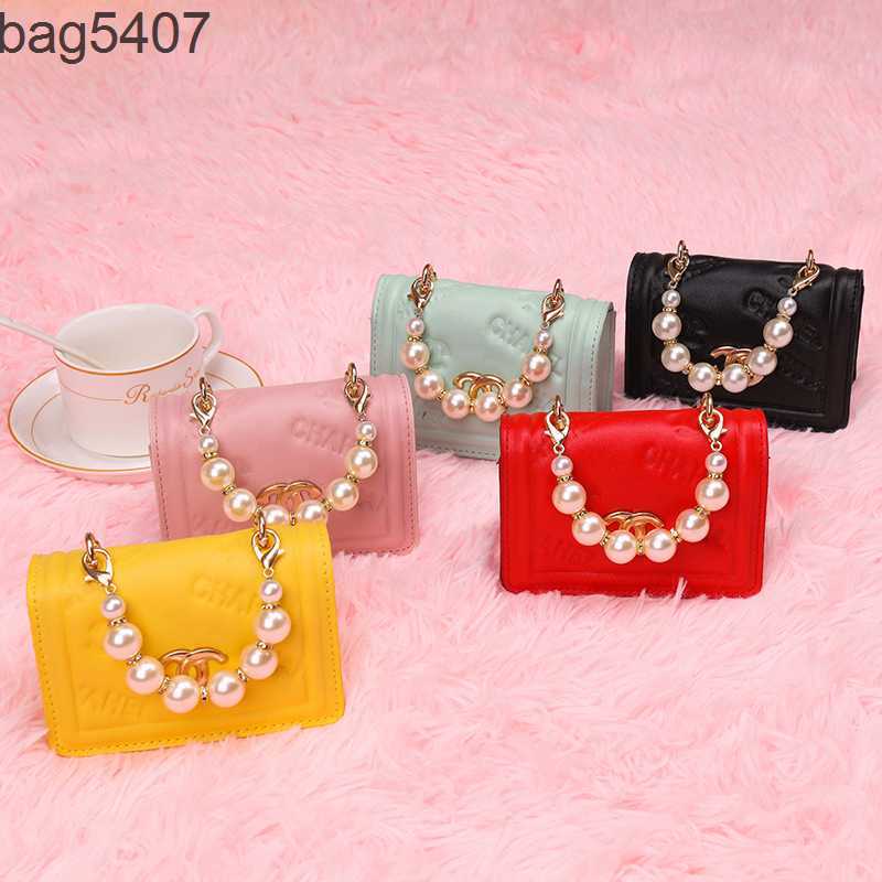 

Luxury Design Bag Ladies Purseshop Wholesale and Retail Summer New Style Children's Fashion Small Shoulder Bag Msenger Pearl Chain Simple Atmosphere, Black