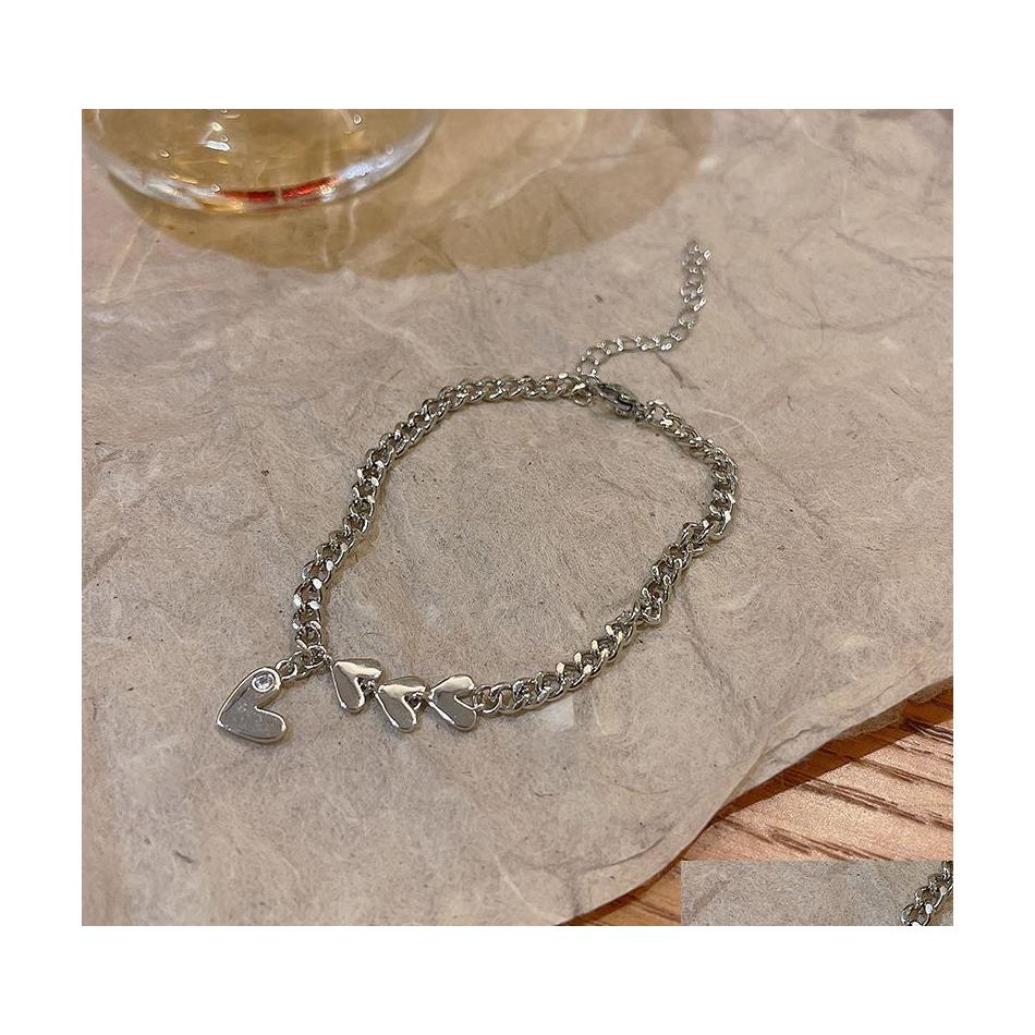 

Charm Bracelets Fashion Jewelry Charms Bracelets For Women Heart Pendant Figaro Chain Bracelet Drop Delivery Dhcnz