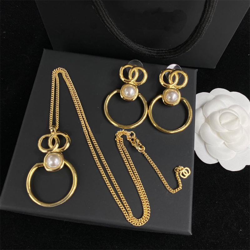 

Designer necklace with large hoop earrings cjewelry designers necklaces with box