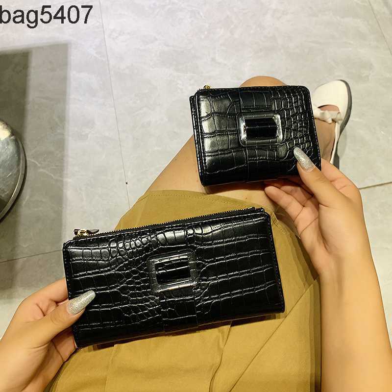 

Luxury Design Bag Ladies Purseshop Wholesale and Retail Small Fashion Multi Slot Women's Wallet 2023 New Solid Color Student Zipper Change Clip Vertical Card Bag, Short black