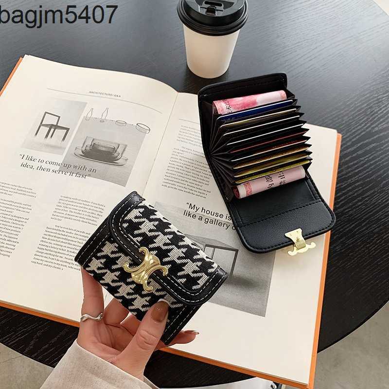 

Design Bag Ladies Purse Ouhuochao Brand Qianniaoge Wallet Three Fold Rivet Short Multi Card, Black