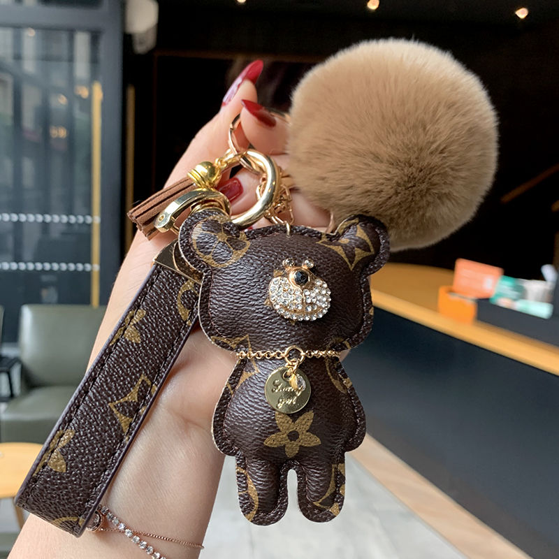 

Designer keychain bear leather fur ball charm key chain car pendant metal fashion personality creative couple checkered variety of styles very good