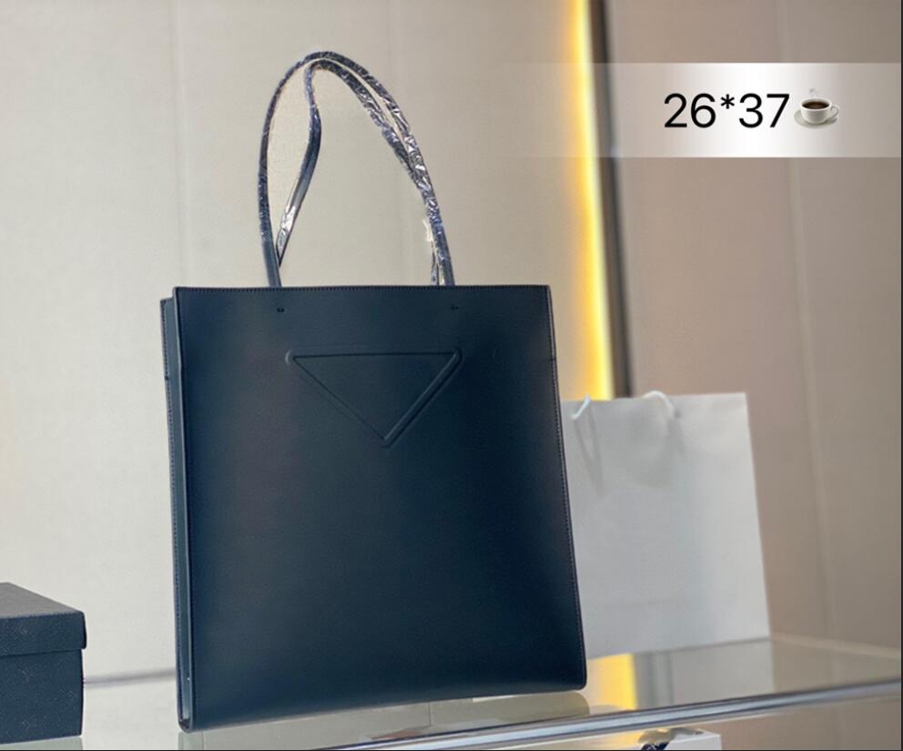 

Luxury Designers Handbags Men Womens Fashion Medium Tote shopping Shoulder Bags Black White cowhide Handbag Lady Daily Storage triangle nameplate Totes