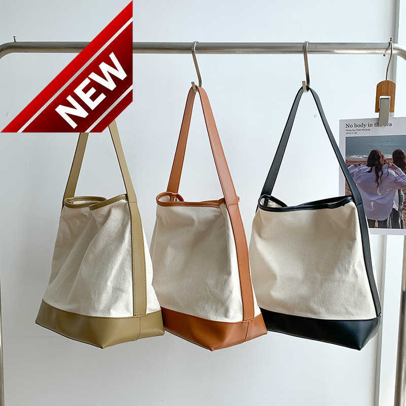 

Designer Bags for Women New Arc De Triomphe Tote Large Capacity Women's Canvas Ins Style Niche Splicing Shoulder bag Fashion Factory Direct Sales, Black5