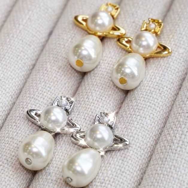 

Designer vvan earrings Vivi Queen Saturn Pearl Earrings Female Net ins Silver Planet Small delicate