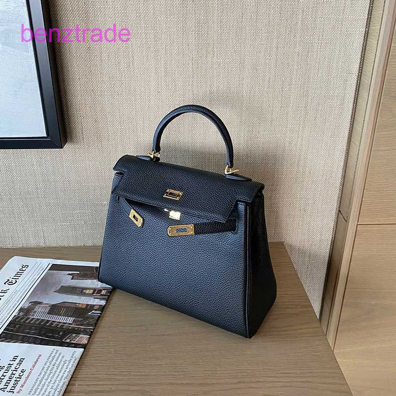 

Herme Kely bags for women online shop Lychee striped cow leather Togo sewn in women's hand shoulder, Classic black