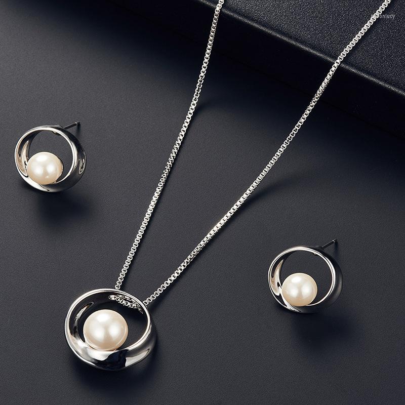 

Necklace Earrings Set Classic Pearl Inlaid Irregular Hollow Round Metal Hoop Pendent Korean Neck Ear For Women Girl, Picture shown