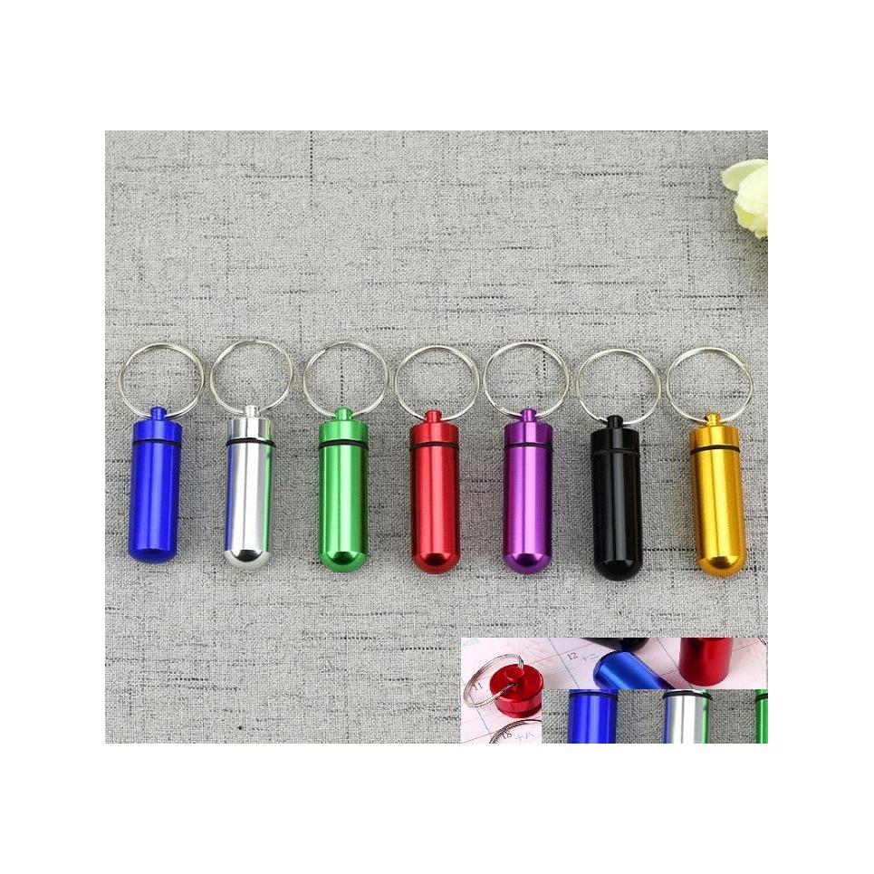 

Keychains Lanyards 7 Colors Metal Container Keychain Aluminum Pill Box Holder Portable Mtifunction First Aid Pills Key Chain Bottl Dhktx