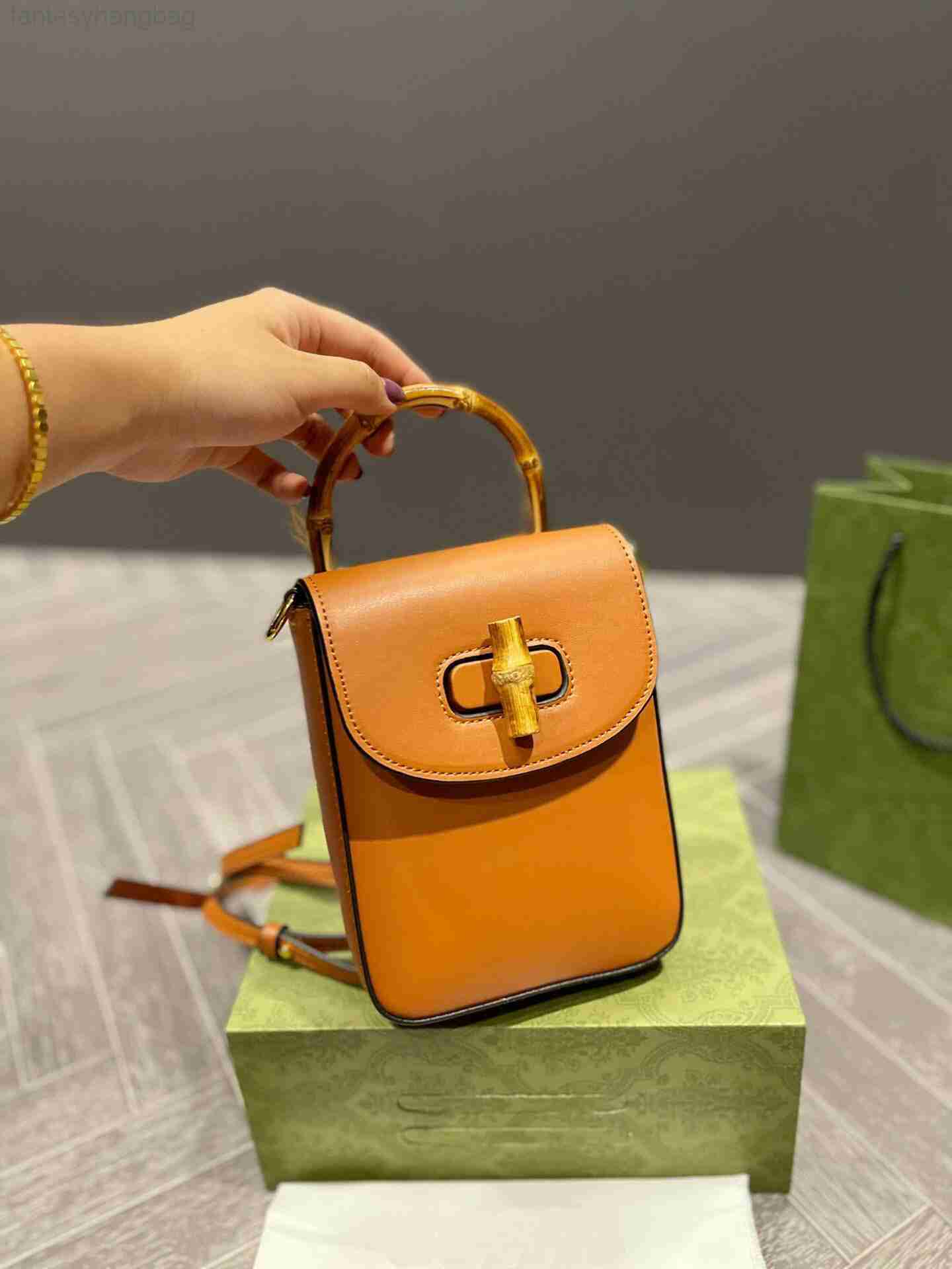 

Designer Bags Ladies Classic Solid Plaid Letter Pattern Mobile Bag Bamboo Handle Design Clutch Adjustable Shoulder Strap Mini ggity, Customize