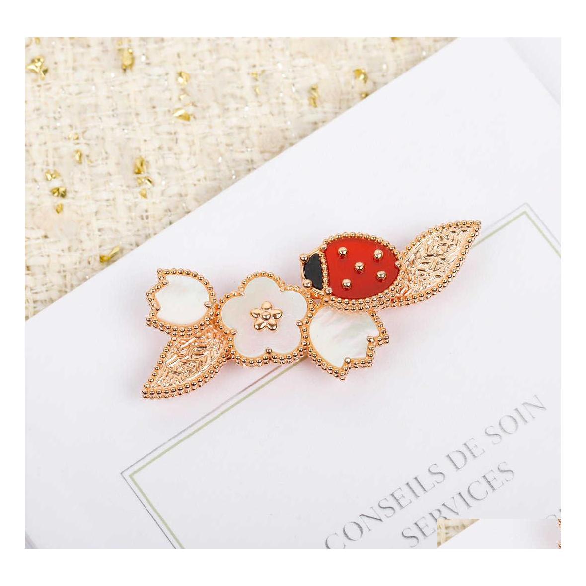 

Pins Brooches Top Quality Luxury Brand Pure 925 Sier Jewelry Lovely Ladybug Lucky Spring Design Cherry Leaf Mother Of Pearl Gemston Dhu6E