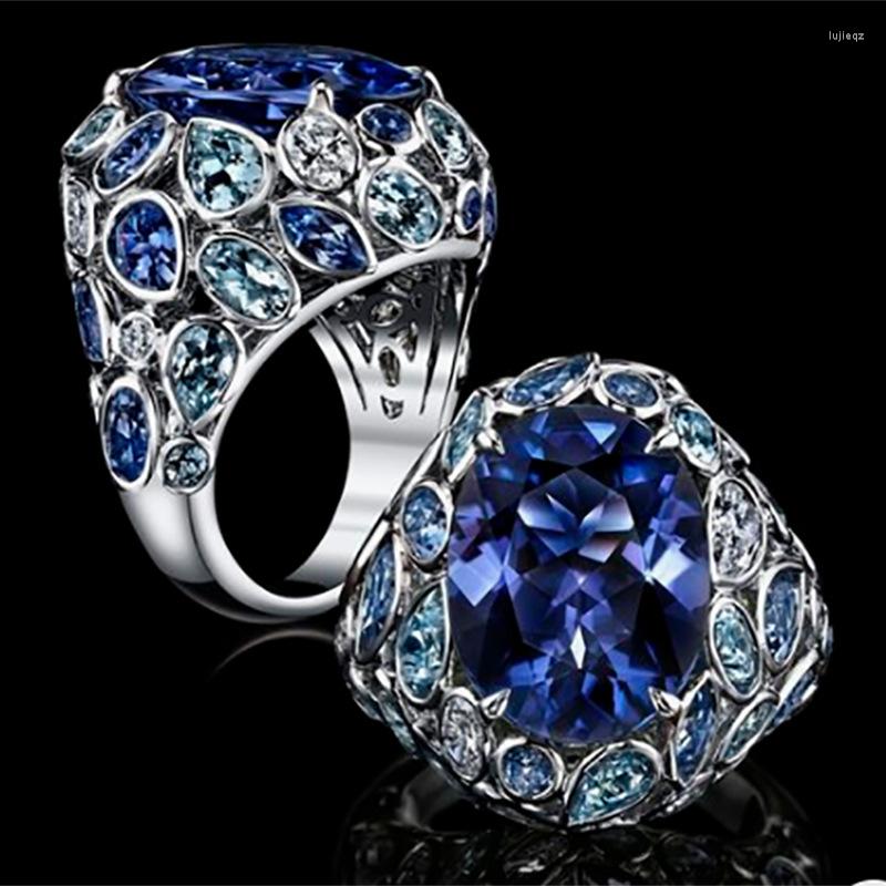 

Wedding Rings Fashion Big Blue Stone Ring Exquisite Oval Women CZ Promise Engagement Ladies Accessories Charm Jewelry