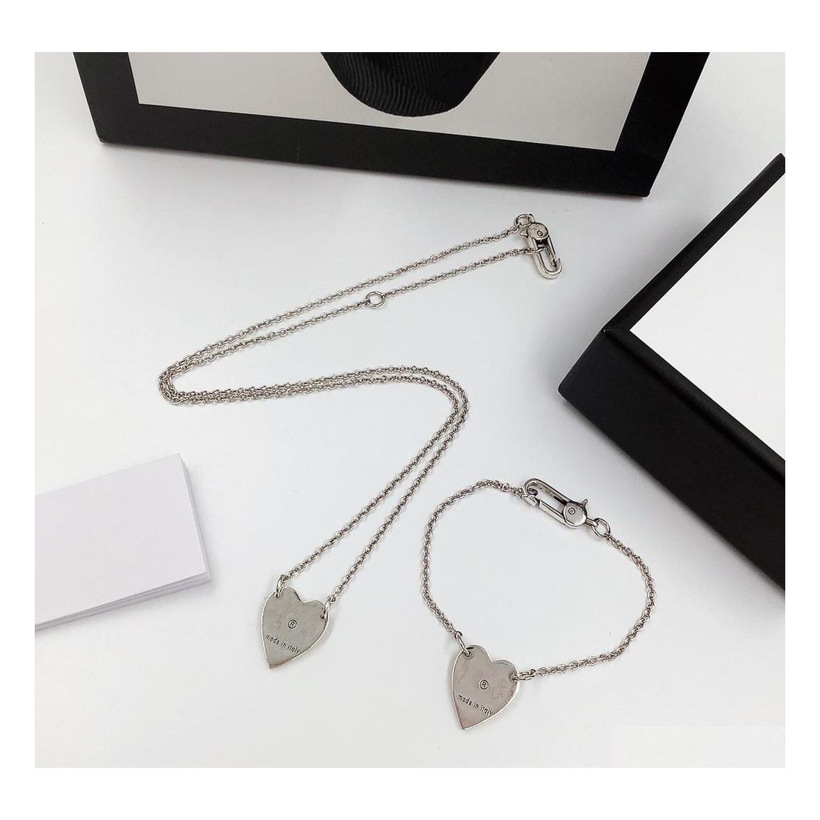 

Pendant Necklaces Top Luxury Designer Necklace Chain Heart Necklaces For Women Original Design Quality Love Bracelet Jewelry Supply Dhyeo
