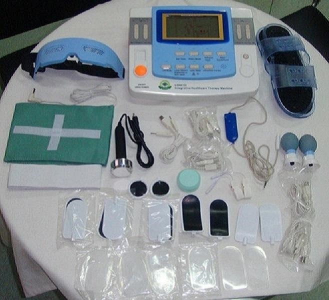 

Physiotherapy massager therapeutic apparatus with ultrasound and laser therapy