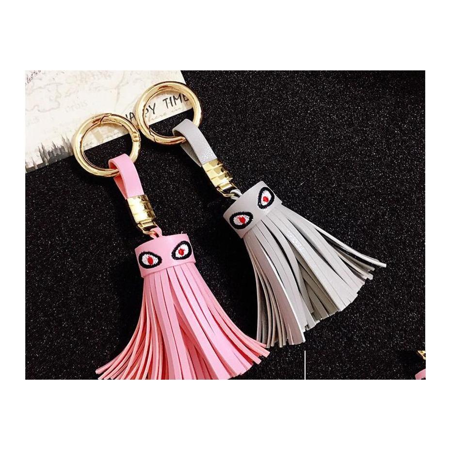

Keychains Lanyards Demon Little Monster Eyes Keychains Pu Tassel Small Pendant Couple Fashion Bag Key Chain Drop Delivery Accessori Dhhdk
