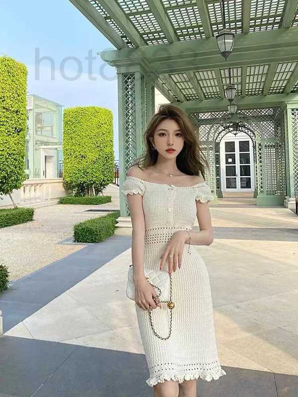

Casual Dresses designer High end 22 New Medium length Hollow Knitted Slim Fit Waist One Shoulder Dress 3H7H, Milky white