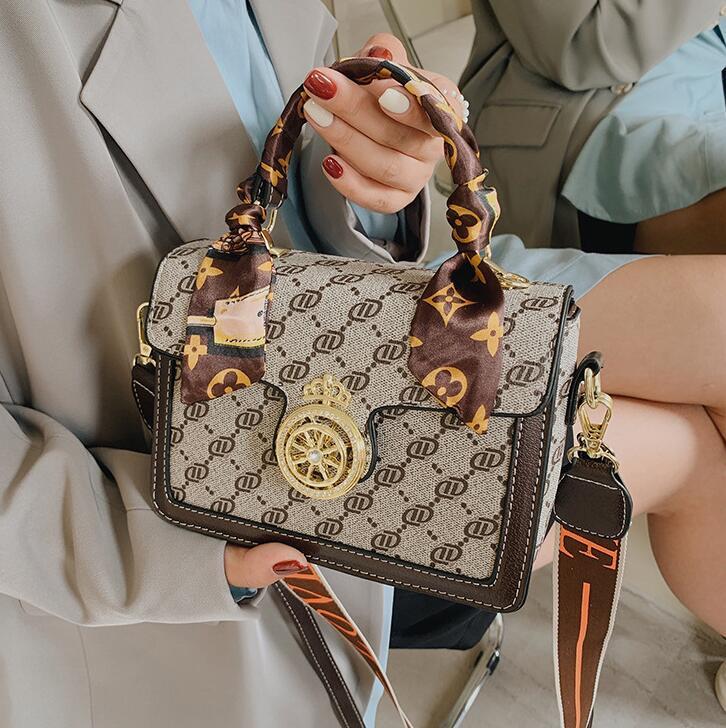 

Wholesale ladies leather shoulder bag elegant letter printed fashion handbags retro exquisite ribbon decorated ladies backpack sweet buckle diamond handbag, Coffee-9059
