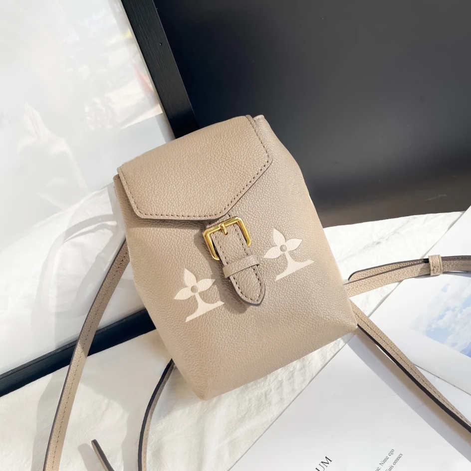 

Backpack M80738 M80596 Genuine Leather designer luxury Backpacks TINY fashion famous Handbag Shouler school Bag Shoulder Bags Black Letter Embossing rucksack bag, Pink