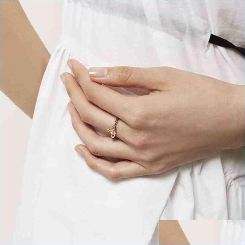 

Band Rings Mens And Womens Ring Fashion Brand Vivienne Pin Light Luxury Flash Diamond Band Rings Designer Punk Style Jewelry Drop Del Dhqx7
