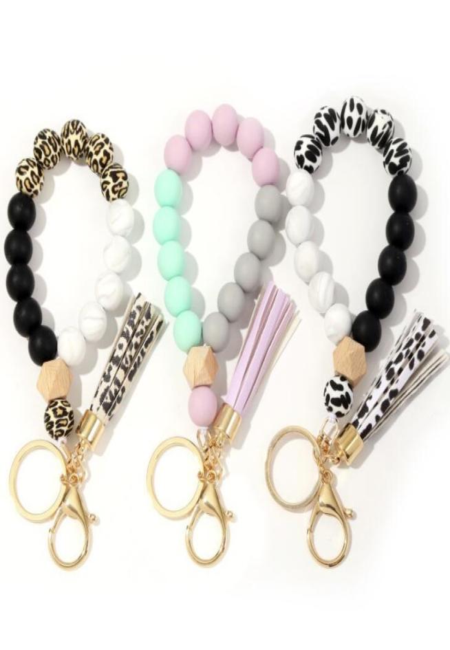 

Silicone Keychain Tassel Wood Beads Bracelet Keyring For Women Whole Multicolor Keys Accessories5284759
