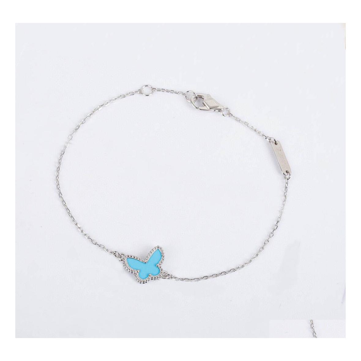 

Charm Bracelets S925 Sier Pendant Bracelet With Blue Butterfly Shape In Two Colors Plated And Rhombus Clasp For Women Wedding Jewelr Dh4Zu