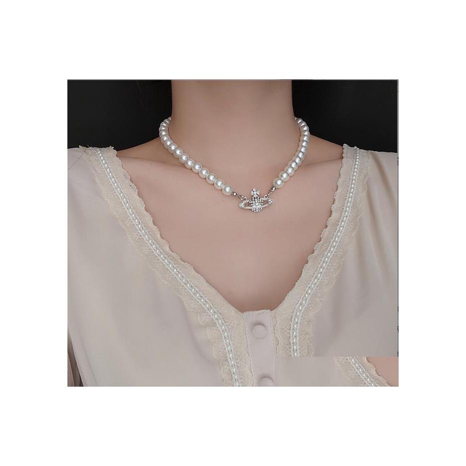 

Pendant Necklaces Simple Flash Diamond Necklace Fl Of Planet Pearl Clavicle Chain Female Drop Delivery Jewelry Pendants Dhh2L