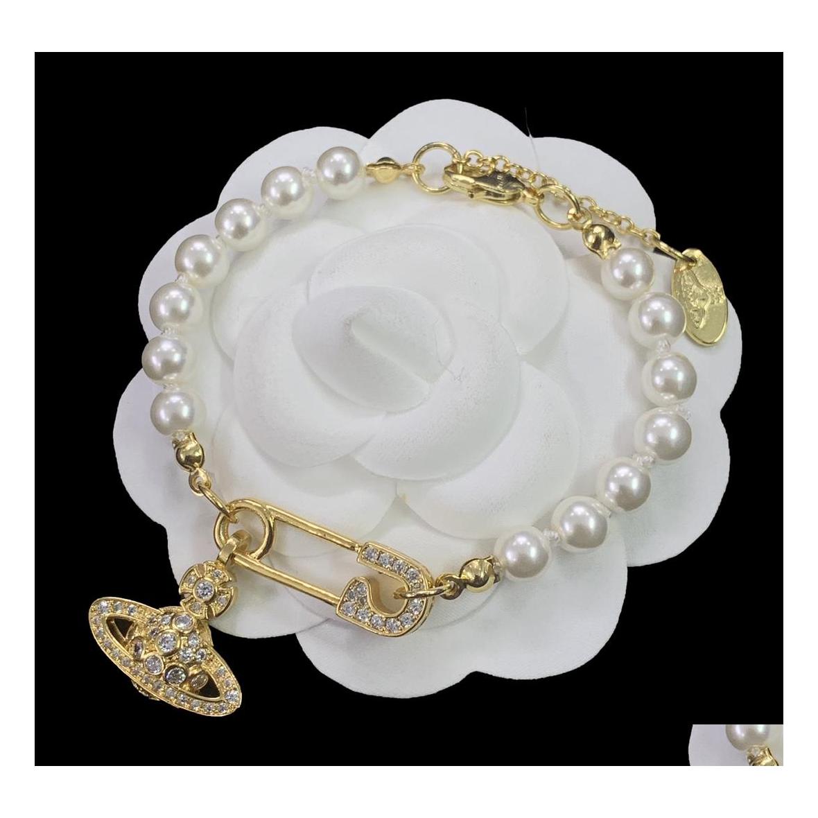 

Chain Micro Inlays Crystal Diamonds Pearl Pin Link Fashion Designed Color Planet Bangles 18K Gold Plated Womens Ladies Bracelets Des Dhxc8