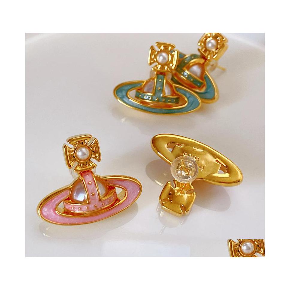 

Stud Pink Planet Retro Inlaid Pearl Enamel Glaze Womens Stud Earrings High Quality Fashion Ladies Designer Jewelry Drop Delivery Dhdc1