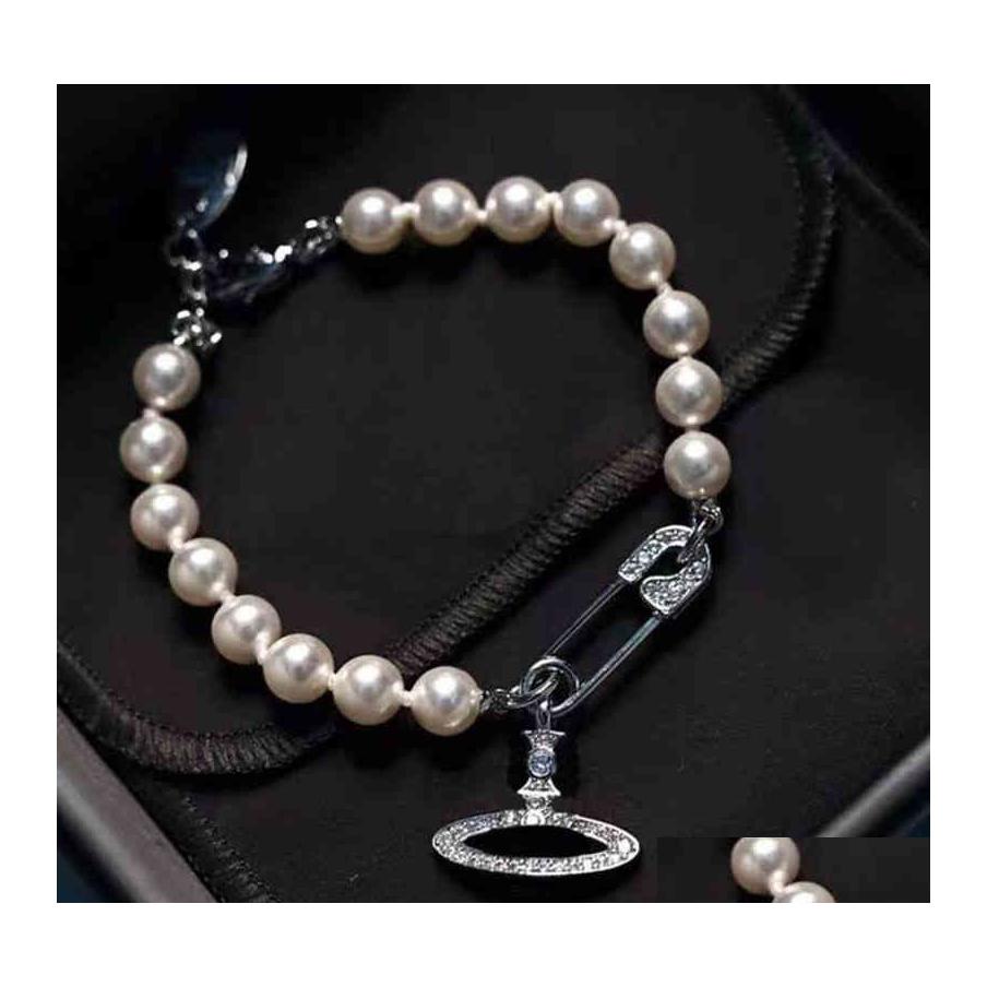 

Charm Bracelets Vivi Luxury Charm Bracelets Designer Bracelet Women Punk Diamond Pearl Chain Bangle Drop Delivery Jewelry Dhpg5