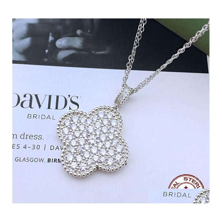 

Pendant Necklaces European And American S925 Sterling Sier Seiko Clover Fl Diamond Double Sweater Female Large 25Mm 337J Drop Delive Dhsaw