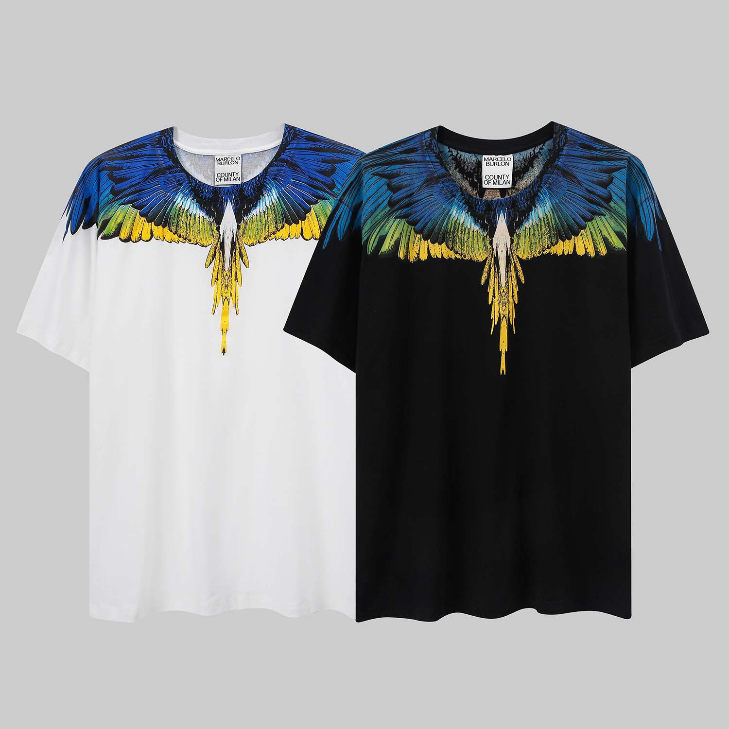 

Marcelo BURLon Mens Summer Round Neck T Shirt Designer Short Sleeve Casual Tees Couples Fashion Blue Yellow Wings Print Tops Size XS, White
