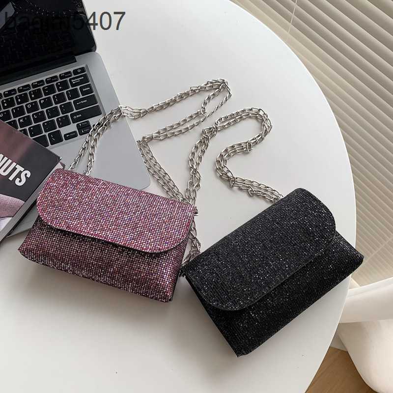 

2023 Fashion Rhinolite Bag 80% Discount Wholesale and Retail New Women's Chain Super Flash Water Suit with Phone Single Shoulder Oblique Small Square, Silver5