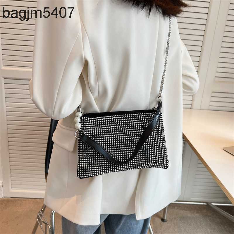

2023 Women's Diamond Bag 80% Discount Wholesale Retail New Fashion Armpit Portable Msenger Female Summer Letter, Silver6