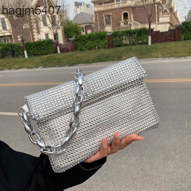 

2023 Fashion Rhinolite Bag 80% Discount Wholesale and Retail Spring New Korean Women's Glittering Small Square Online Red Letter Trend One Shoulder Msenger, Pocket money
