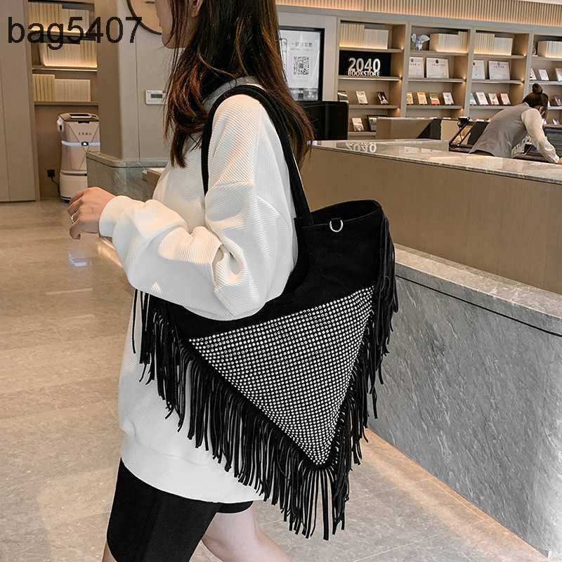 

2023 Women's Diamond Bag 70% Discount Wholesale Retail Summer Fashion Personality Tassel Simple One Shoulder Texture Diagonal Span Geometry, Silver6
