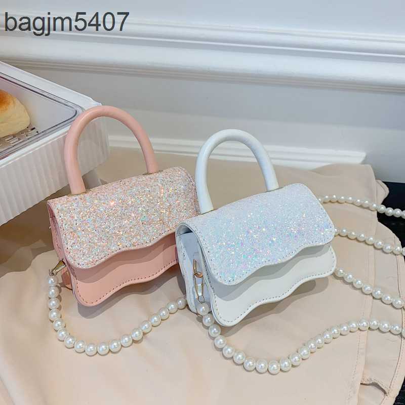 

2023 Fashion Rhinolite Bag 80% Discount Wholesale and Retail Small Dign New High Sense Women's Mini One Shoulder Cross Body Hand, White6