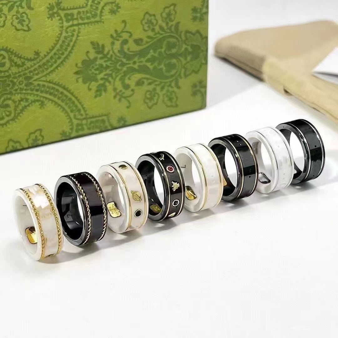 

Designer rings Ceramic Planet classic bilateral twist bee elements male and female couples pair ring high-end gift