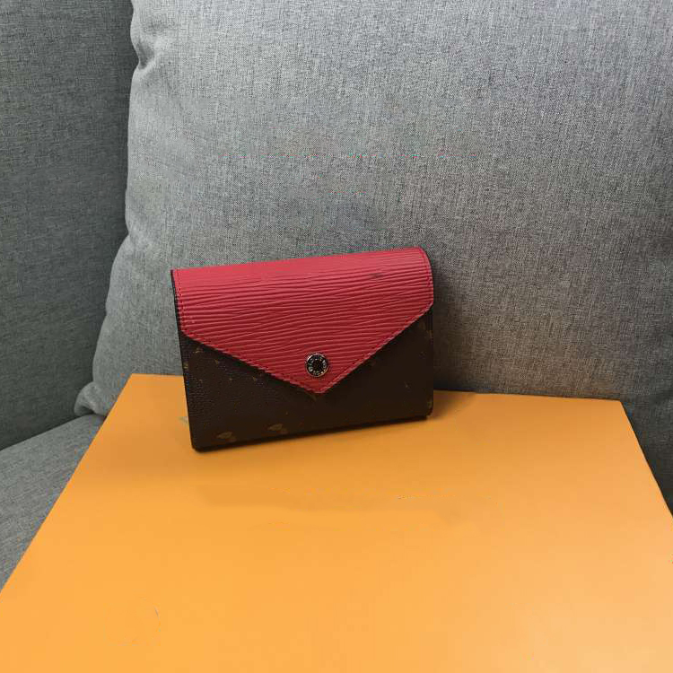 Nouveau bouton de concepteur femmes portefeuilles courts mode féminine zéro sac à main style européen dame embrayages occasionnels portefeuille c
