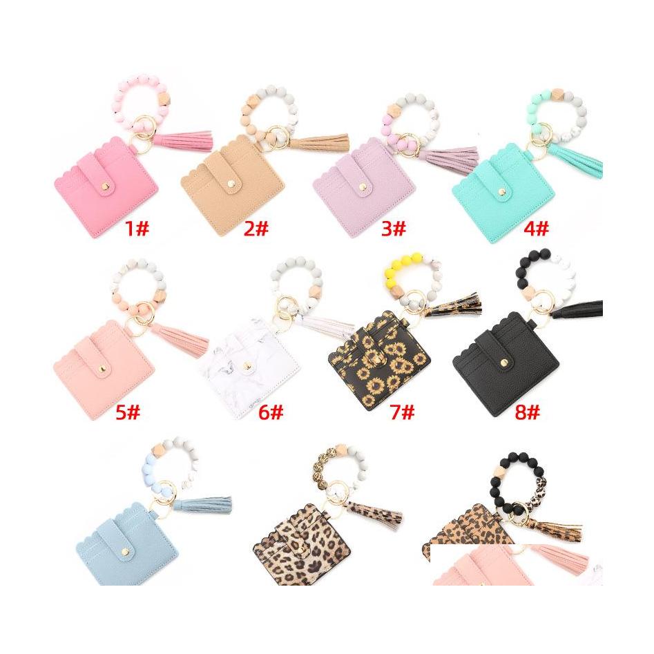 

Party Favor Fashion Pu Leather Bracelet Wallet Keychain Tassels Bangle Key Ring Holder Card Bag Sile Beaded Wristlet Keychains Handb Dhtnx
