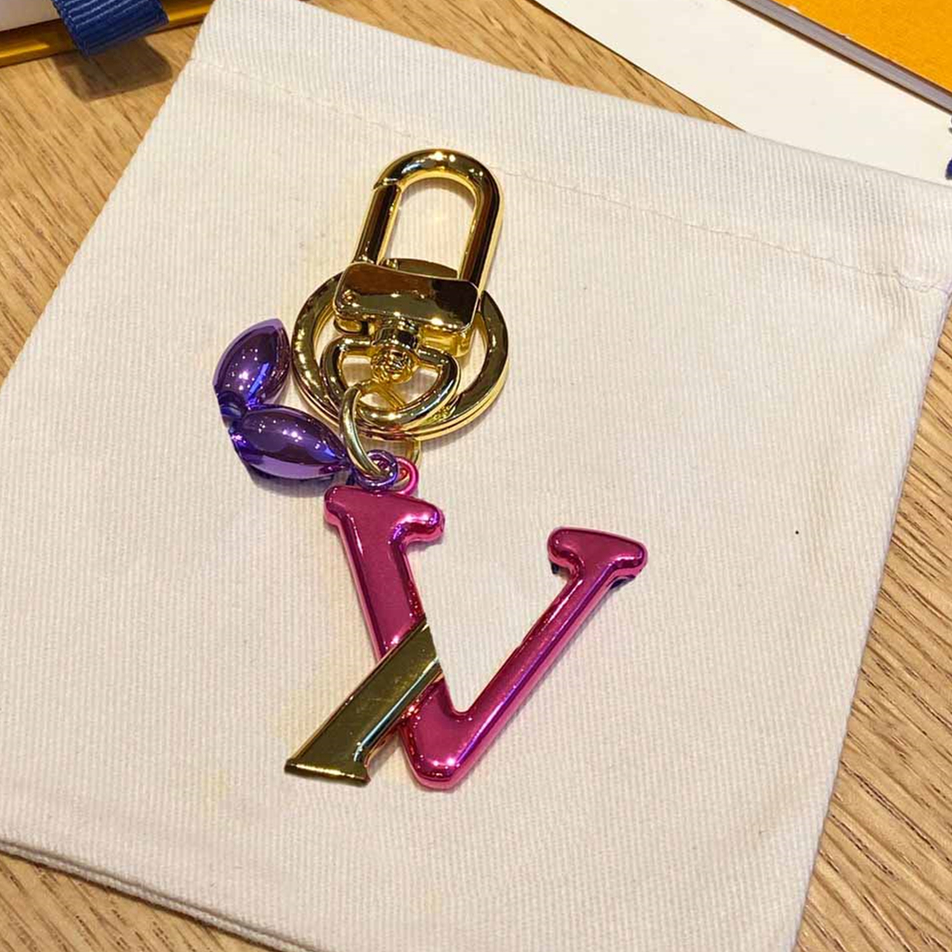 Nouvelle mode porte-clés clés de boucle de boucle de boucle conception de couvertures en cuir fait à la main les hommes de sac femmes pendentif a