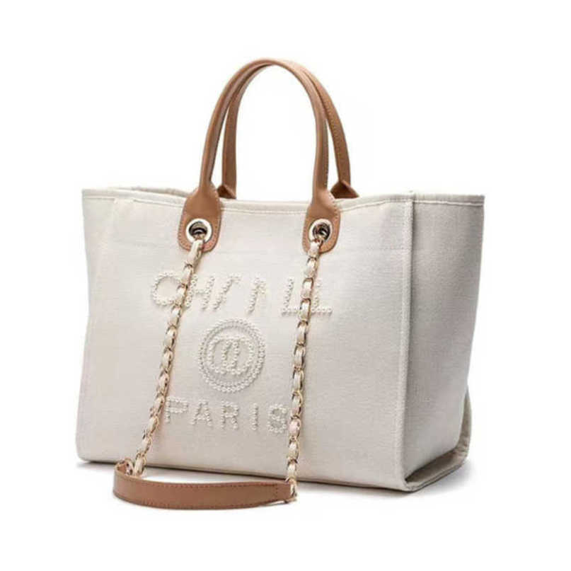 

Evening Luxury Women's Classic Bags Ch Brand Canvas Handbag Fashion Pearl Beach Hand Bag Designer Female Large Backpack Small Packs Portable Shopping Handbags Eds7