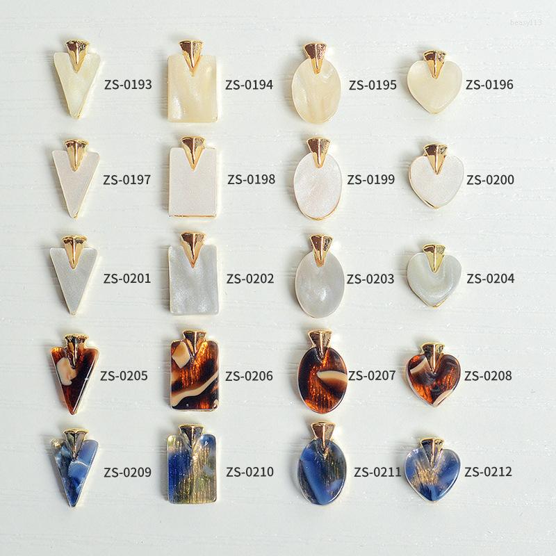 

Nail Art Decorations HFTM 100PCS/Lot Shell Rhinestones 3D Shiny Alloy Jewelry Fashion Design Manicure Ornaments Tool VE5346