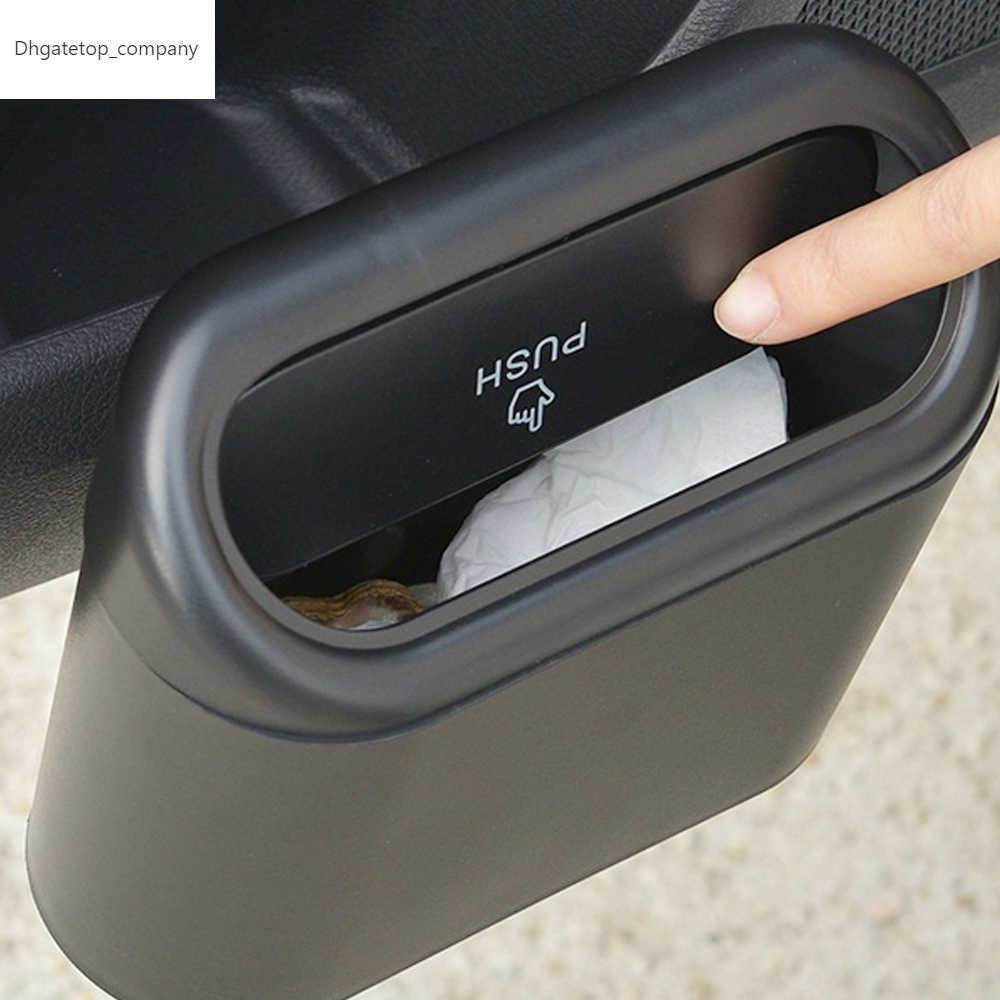 

Automobile multi-function garbage container Tesla 3 ABS pressure garbage manager storage bin bounce box