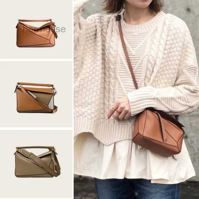 

Designer Evening Bags 2022 new chaoluo family messenger bag leather women's bag geometry Mini Lingge cross hand bill of lading, Black plain