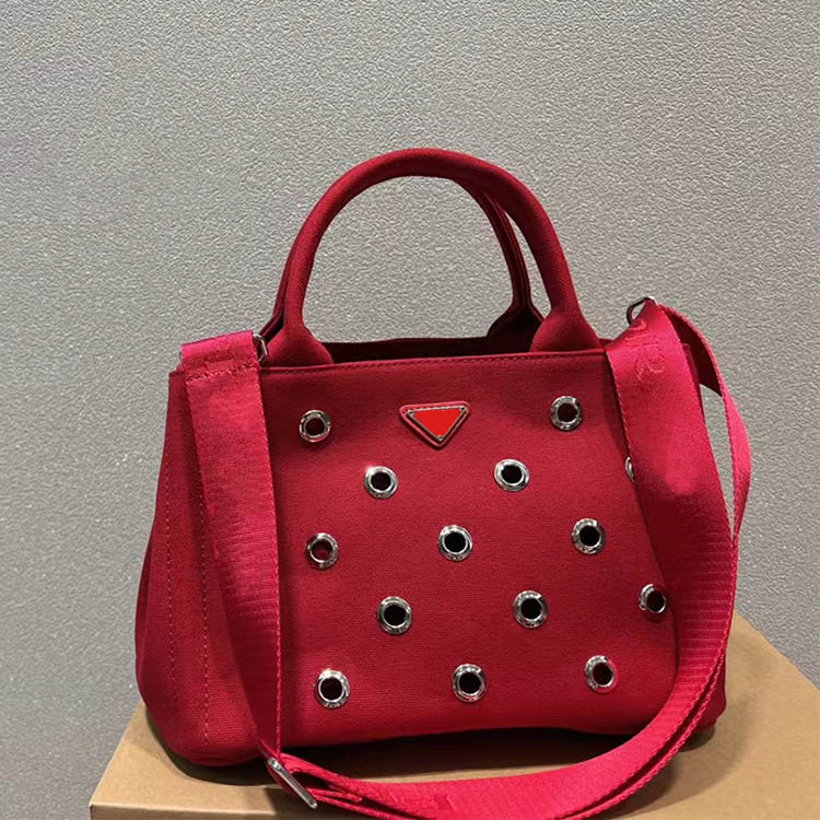

Hollow out Beach bag Desinger handbag New Canvas bag Triangular pattern women crossbody purse with long shoulder strap, Red