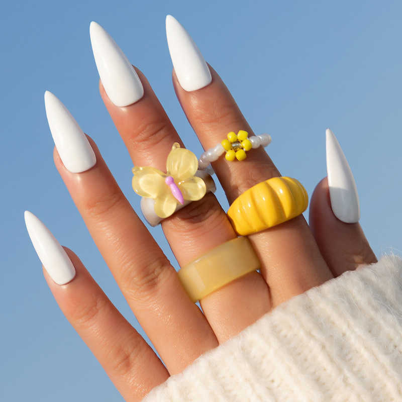 

Fashion jewelry Resin ring rice bead flower wide face acrylic butterfly ring four piece set