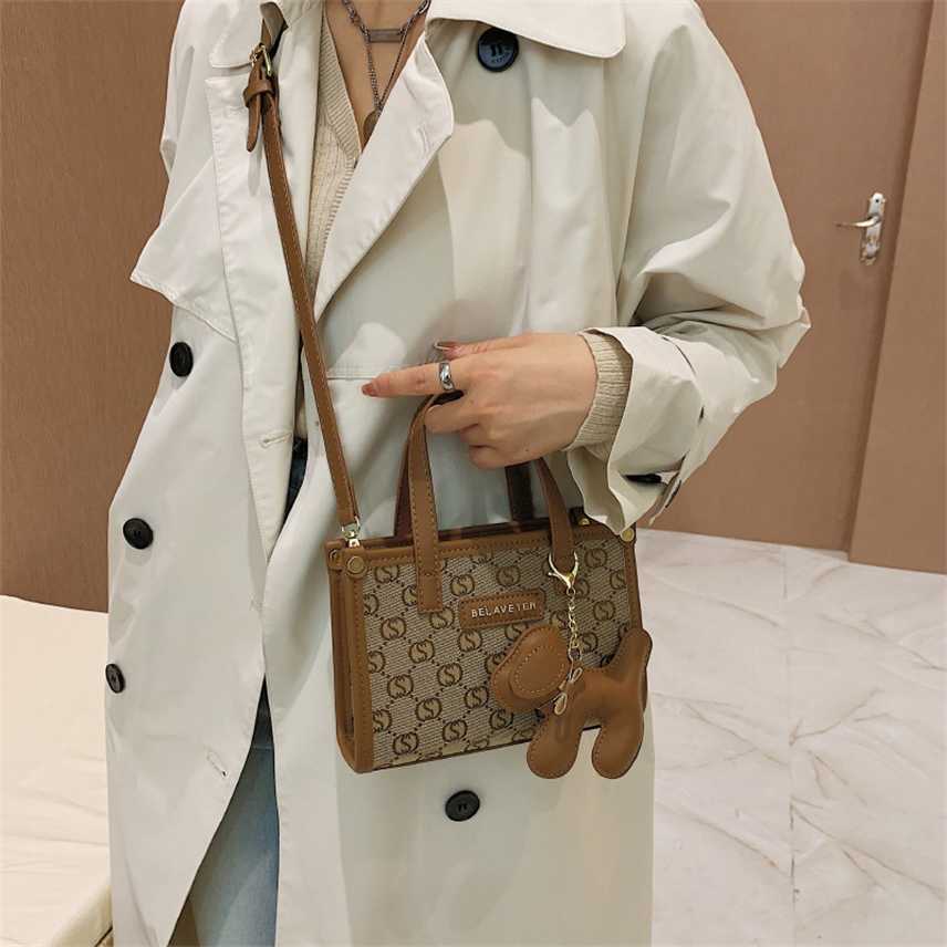 

Handbag Hand women's autumn winter dog pendant printing small square bag fashion sling single Shoulder Messenger Bag, White