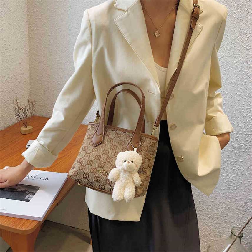 

Clearance style bag women's summer new texture diagonal small square simple and versatile atmospheric one shoulder hand, White